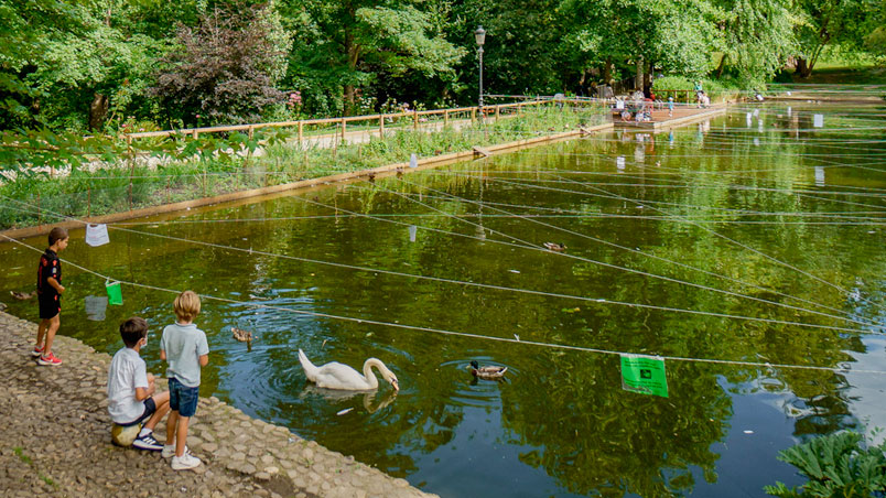 People by the pond