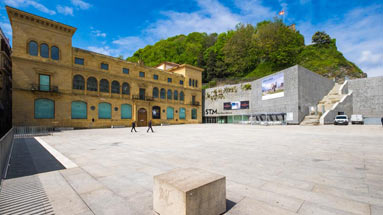 Scene from the film in front of the Sert murals