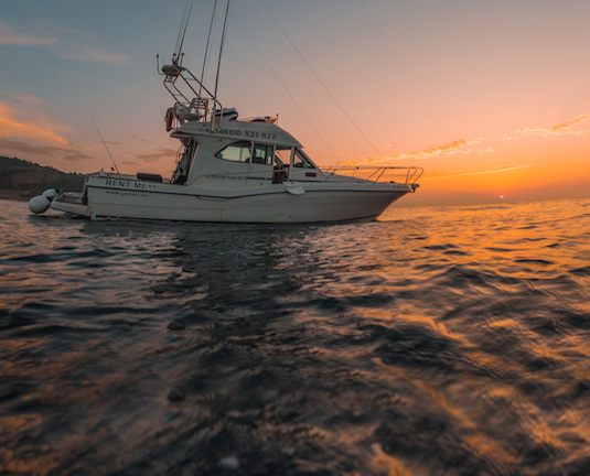 puesta de sol barco